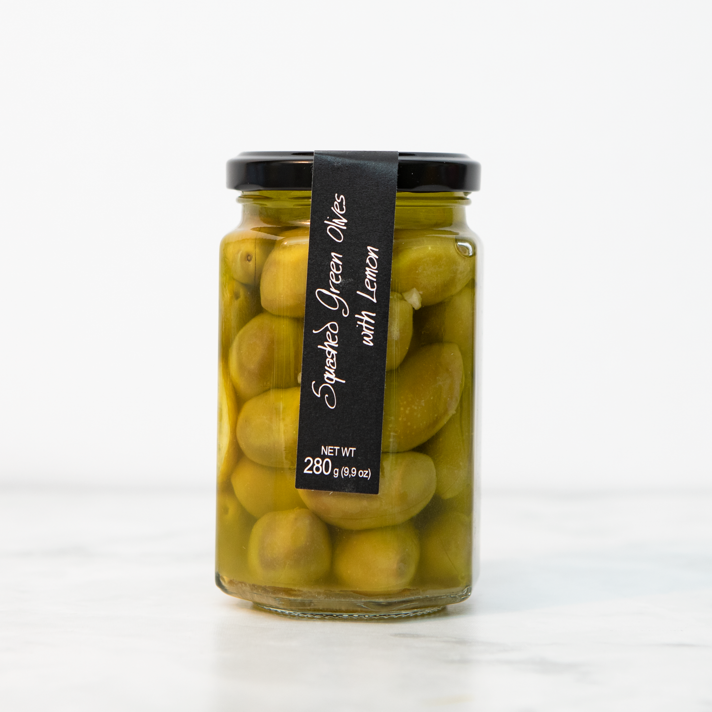 
                  
                    Squashed Olives with Lemon
                  
                